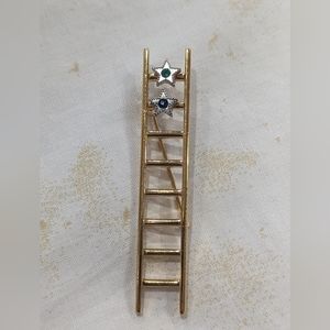 Unique Jacobs ladder gold pin with two stars to represent Angels with gemstones.
